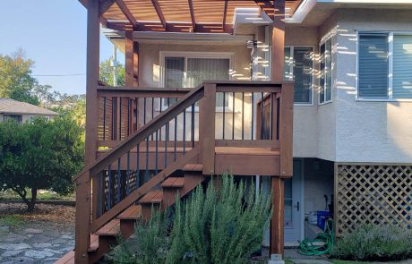 stained porch deck at the back of a house in victoria