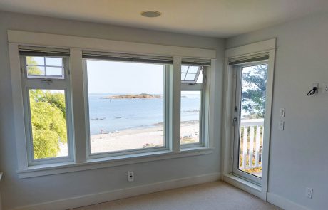 oceanfront beachview from inside the room of an oak bay house in victoria